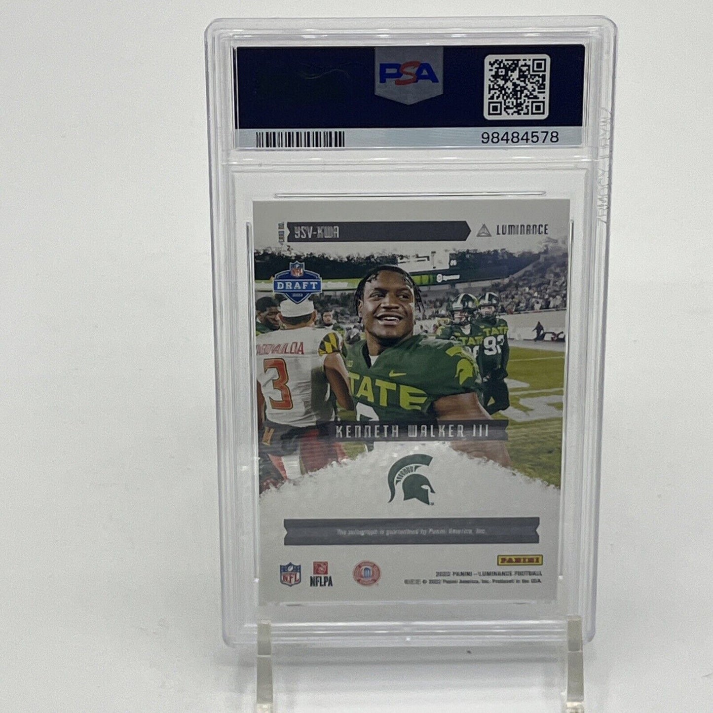 Back of a PSA-graded 2022 Panini Luminance Year One Signatures Kenneth Walker III rookie autograph card showing player information and authentication.