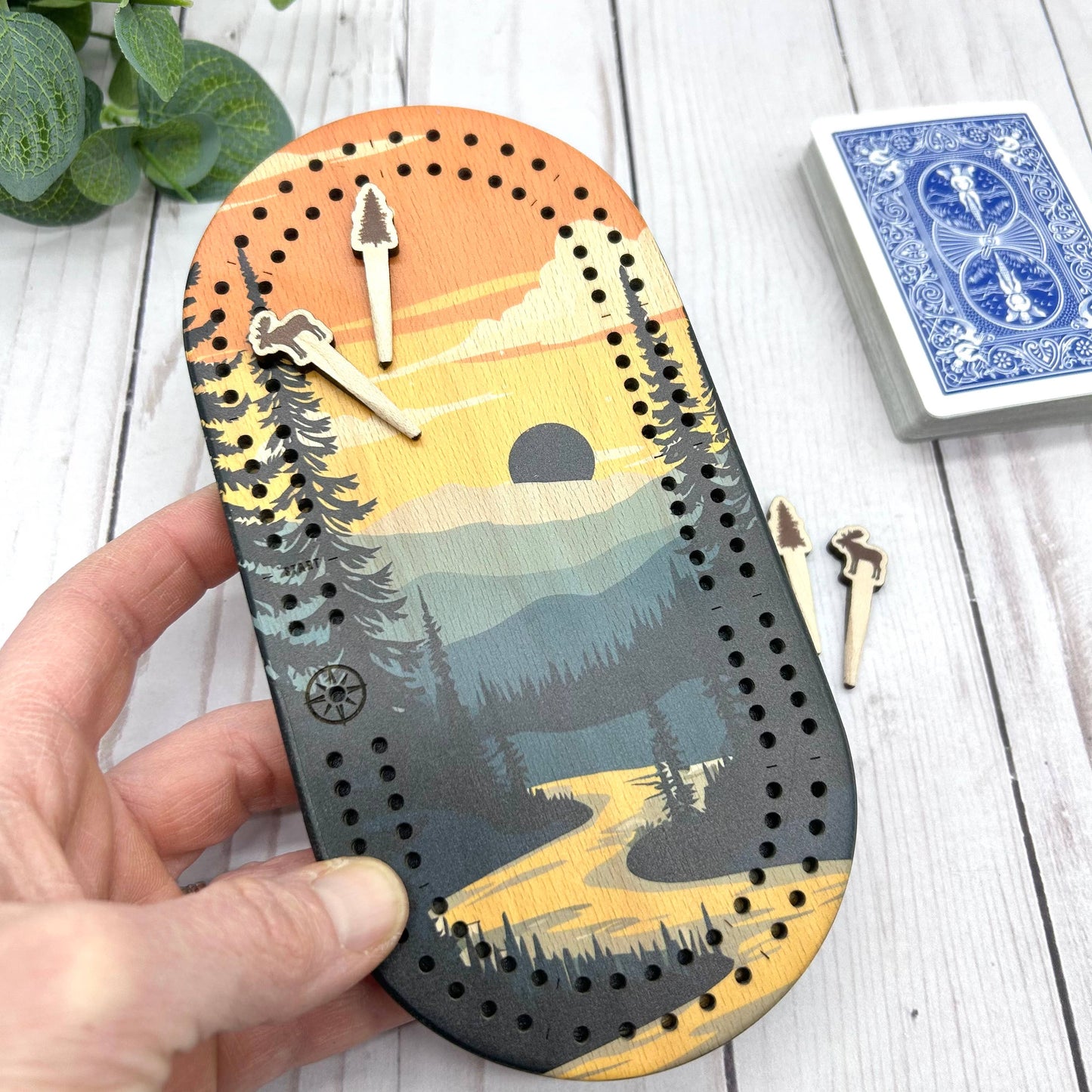 mini travel cribbage board, wilderness cribbage game, pocket cribbage set, Cast and Carve cribbage, wildlife cribbage board, UV printed cribbage board, solid wood cribbage set, eco friendly travel game, Maine-made game board