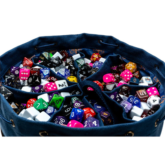 Large collection of colorful dice in separate compartments of the blue and brown dice bag on a white background