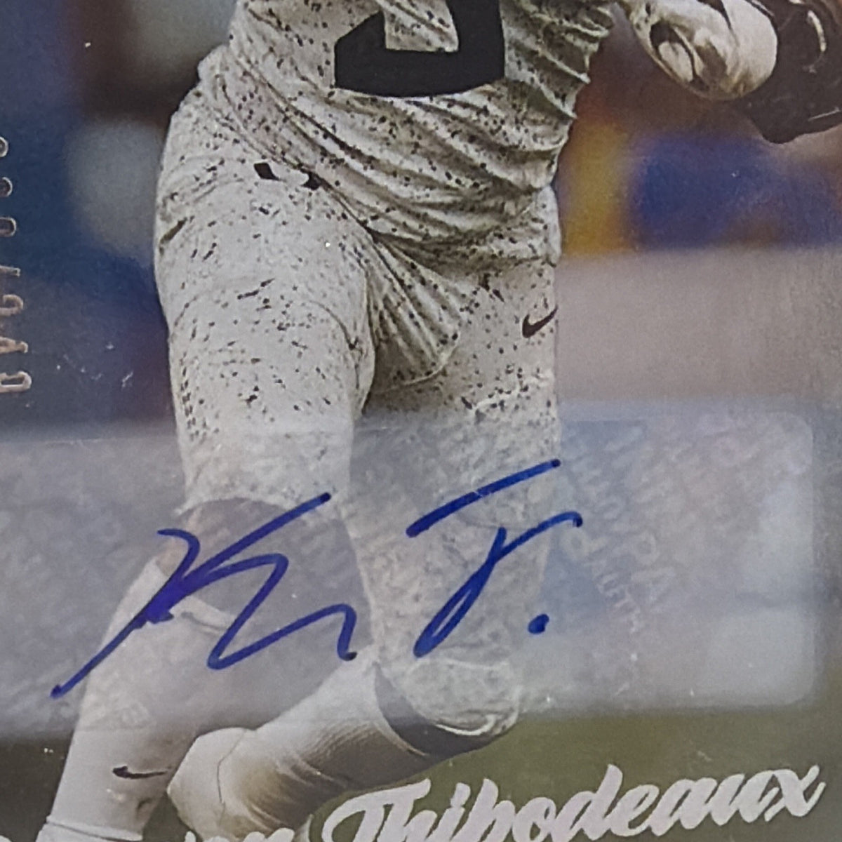 Close-up of the autograph on Kayvon Thibodeaux Luminance rookie card numbered 009/249