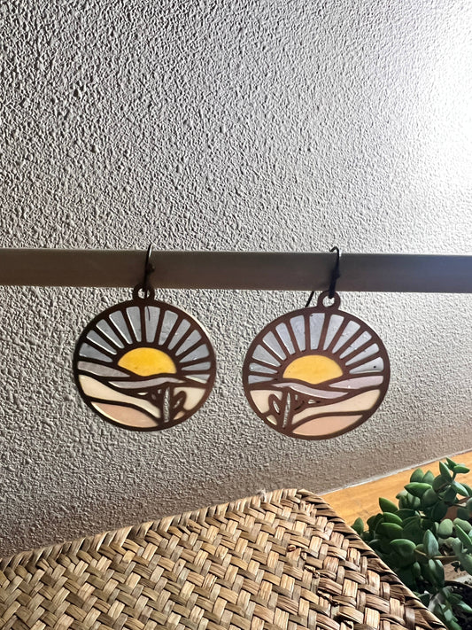 sunset earrings, stained glass resin earrings, brass sunset earrings, colorful statement earrings, nature inspired earrings, sunset landscape jewelry, handmade resin earrings, boho brass earrings, lightweight dangle earrings, artisan earrings for women, unique sunset jewelry, romantic gift for her, Rogue & Rye earrings, outdoor lover gift, handcrafted scenic earrings, resin stained glass jewelry, modern brass earrings, everyday nature earrings, sunset mountain earrings, warm toned earrings