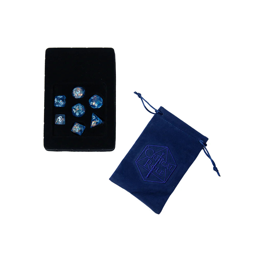 Allura Vysoren dice set, Critical Role dice, Tal'Dorei dice set, arcanist RPG dice, blue iridescent dice set, D&D spellcaster dice, Leia Rondeau dice design, official Critical Role dice set, d20 with Tal'Dorei icon, Allura Vysoren RPG accessories, navy velvet dice bag, Critical Role collector dice, Nikki Dawes box art, magical DnD dice set, dice for mages and wizards