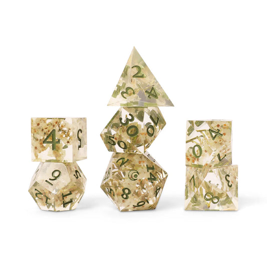 Orym dice set, Air Ashari Critical Role dice, Bells Hells DnD dice, translucent dice with white flowers, crescent moon d20 icon, official Critical Role dice, Die Hard Dice Critical Role set, nature-themed DnD dice, sharp-edged resin polyhedral dice