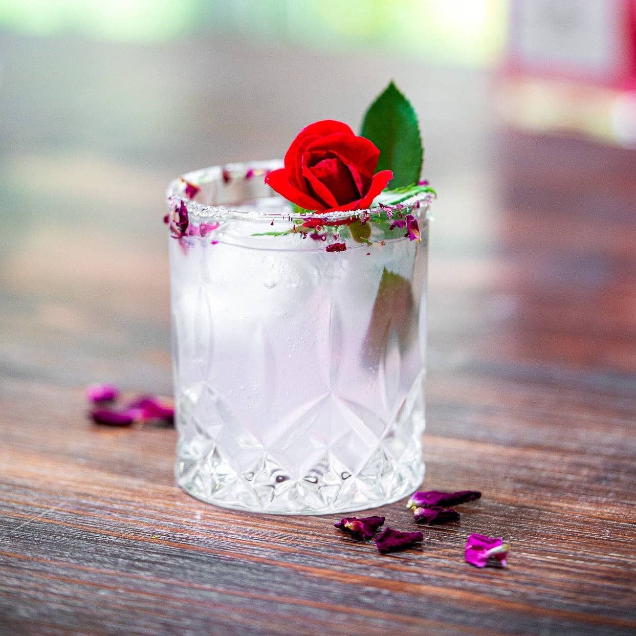 floral cocktail cubes, rose cocktail sugar cubes, RPG drink garnish, potion-themed cocktail accessory, DnD party drink ideas, organic rose cocktail cube, eco-friendly drink mixers, Flouwer Co. cocktail cubes, fantasy game night garnish