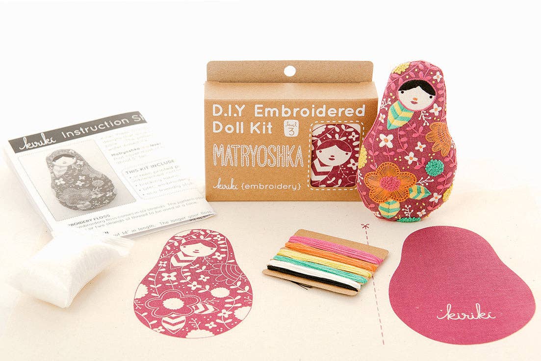 matryoshka embroidery kit, embroidered nesting doll craft, Kiriki Press embroidery, Level 3 embroidery pattern, DIY stitched doll, hand embroidery project, screen printed fabric kit, DMC floss embroidery, heritage-inspired sewing kit, handmade gift idea