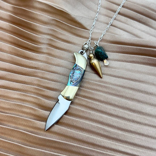mini knife necklace abalone, abalone pocket knife pendant, functional knife jewelry, tiny blade necklace, sterling silver knife necklace, abalone and turquoise necklace, brass point knife pendant, real knife necklace jewelry, compact blade necklace, mini knife for women, clever jewelry gift, small pocket knife necklace, ocean abalone jewelry, adventurer necklace, edgy turquoise necklace