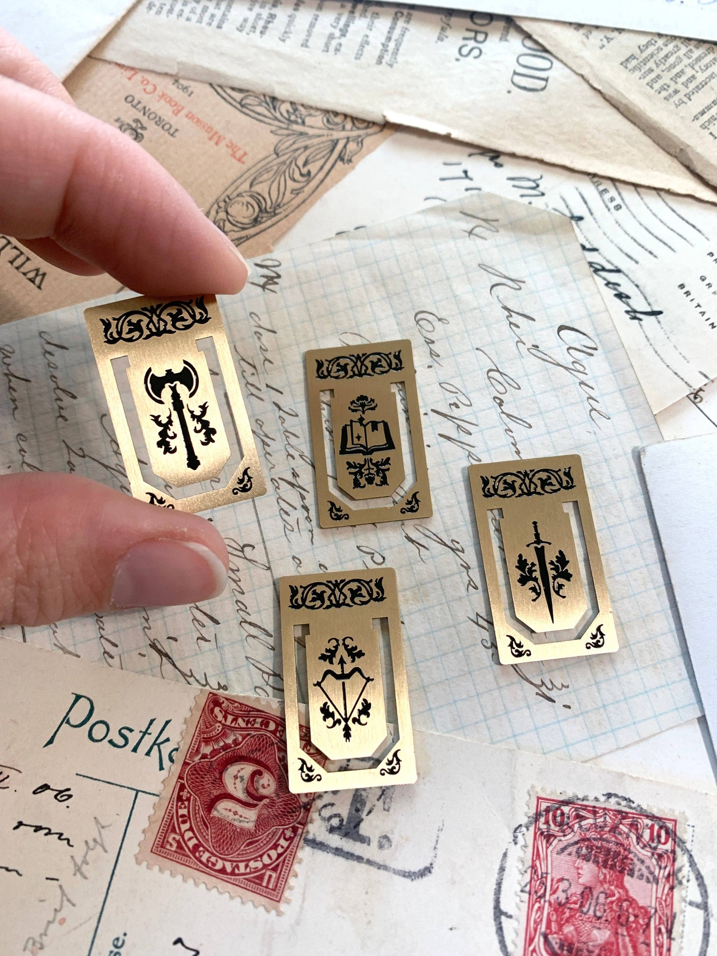 brass page markers, metal bookmarks, mini brass bookmarks, journal accessories, planner bookmarks, reusable bookmarks, aesthetic stationery, brass stationery gifts, book lover gifts, thin metal page markers, sketchbook bookmark set, minimalist bookmark set, golden page tabs, durable metal tabs, vintage-inspired book accessories