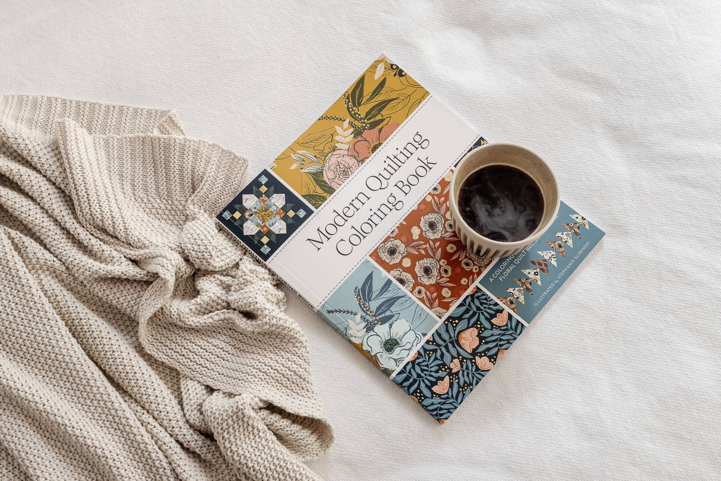 modern quilting coloring book, quilt block coloring pages, Stephanie Sliwinski coloring book, quilting art book, coloring book for quilters, quilt-inspired coloring designs, relaxing quilt coloring book, adult coloring quilting patterns, Moda Fabrics coloring, creative quilting gift