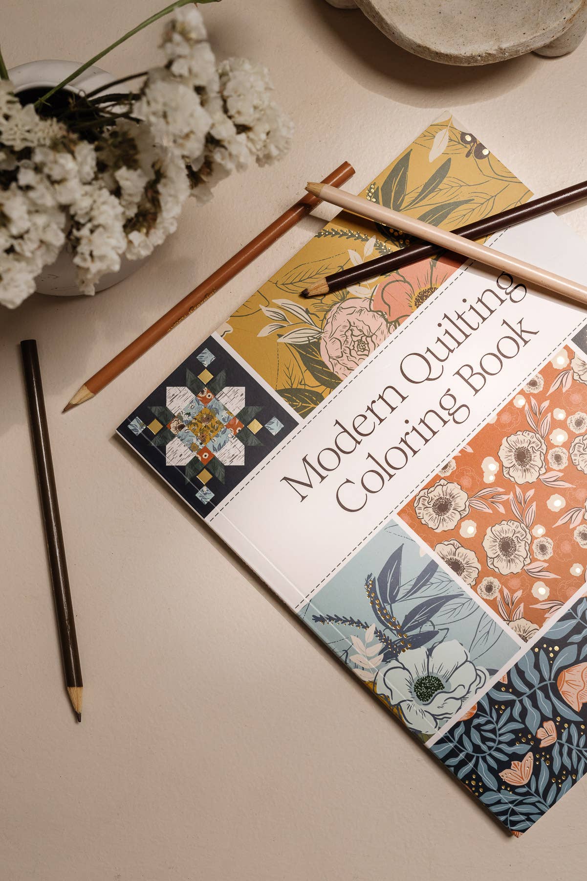 modern quilting coloring book, quilt block coloring pages, Stephanie Sliwinski coloring book, quilting art book, coloring book for quilters, quilt-inspired coloring designs, relaxing quilt coloring book, adult coloring quilting patterns, Moda Fabrics coloring, creative quilting gift