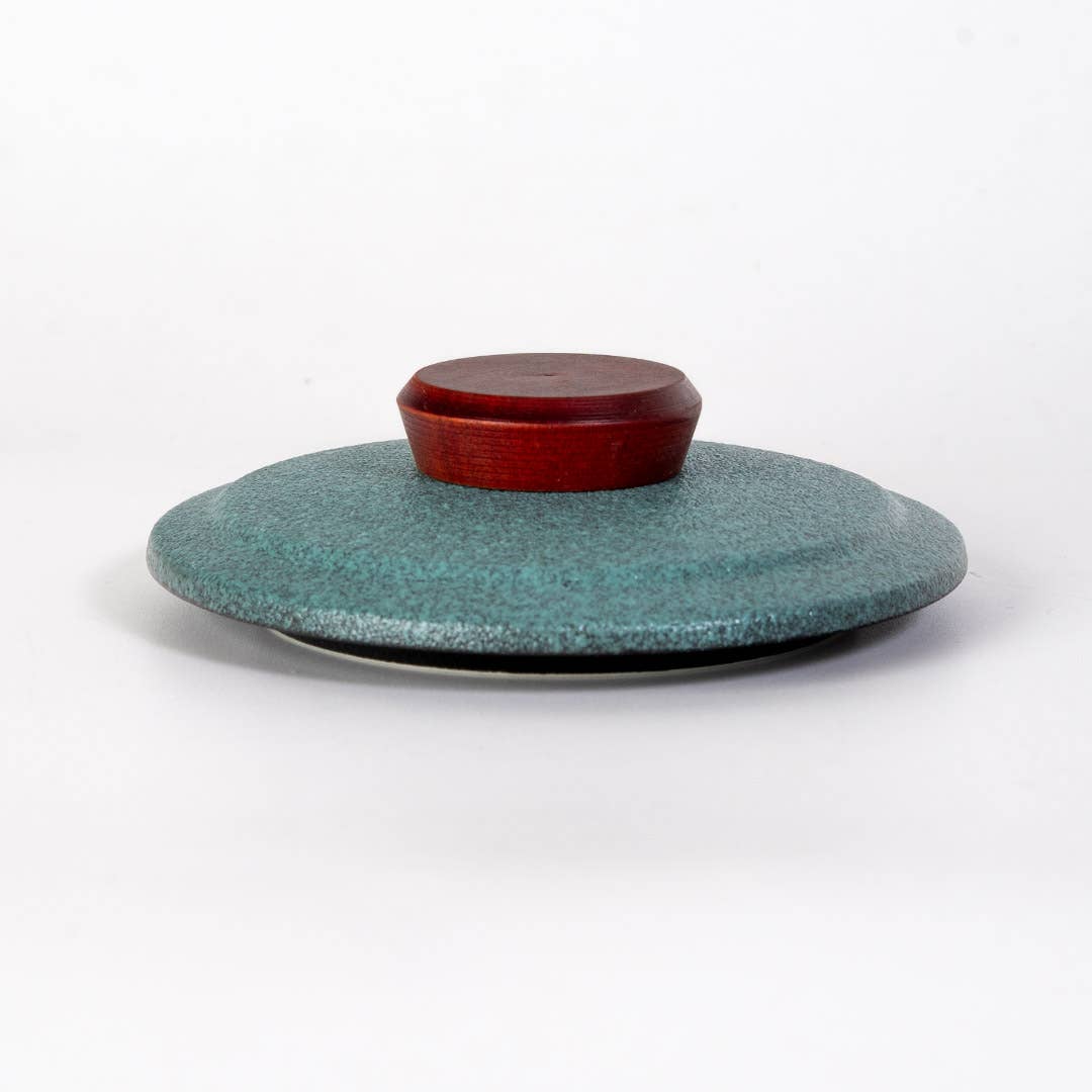 green mountain tea mug, porcelain tea mug with infuser, Urban Tokyo tea mug green, Japanese-style tea brewing mug, loose leaf tea porcelain cup, lidded infuser mug, minimalist green tea mug, modern Japanese home goods, gift for tea drinkers, mountain design mug, cozy kitchen gifts, ceramic tea mug with lid, Rogue & Rye cozy rituals collection, elegant tea accessories, woman-owned brand gift ideas.