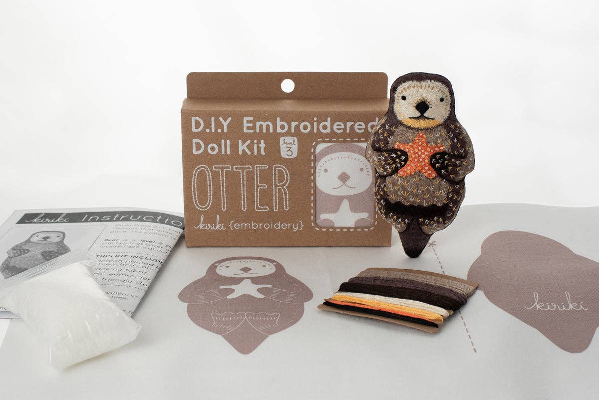otter embroidery kit, Kiriki Press otter, embroidered animal doll kit, DIY embroidery plushie, level 3 embroidery kit, otter stitch doll project, hand embroidery kit for adults, advanced embroidery pattern, embroidered otter craft kit, otter needlework gift idea