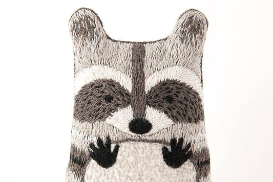 raccoon embroidery kit, advanced embroidery kit, Kiriki Press raccoon, embroidered animal doll kit, level 3 embroidery project, DIY embroidered plushie, raccoon stitch doll, hand embroidery kit for adults, embroidery gift idea, detailed embroidery pattern