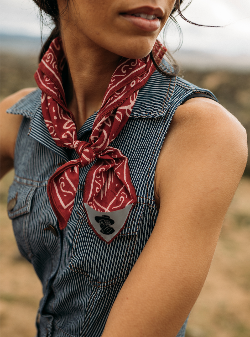 The Good Fight Bandana by Bandits Bandanas features original artwork by Estudio Miopia and is crafted from GOTS-certified, sustainably sourced organic cotton. Fair Trade Certified and ultra-soft, this 21" × 21" bandana is designed for everyday wear—styled at the neck, in the hair, or tied to a favorite bag. Each purchase gives back, with 10% of proceeds supporting Instituto Luisa Mell, making it a meaningful, artist-driven accessory with heart.