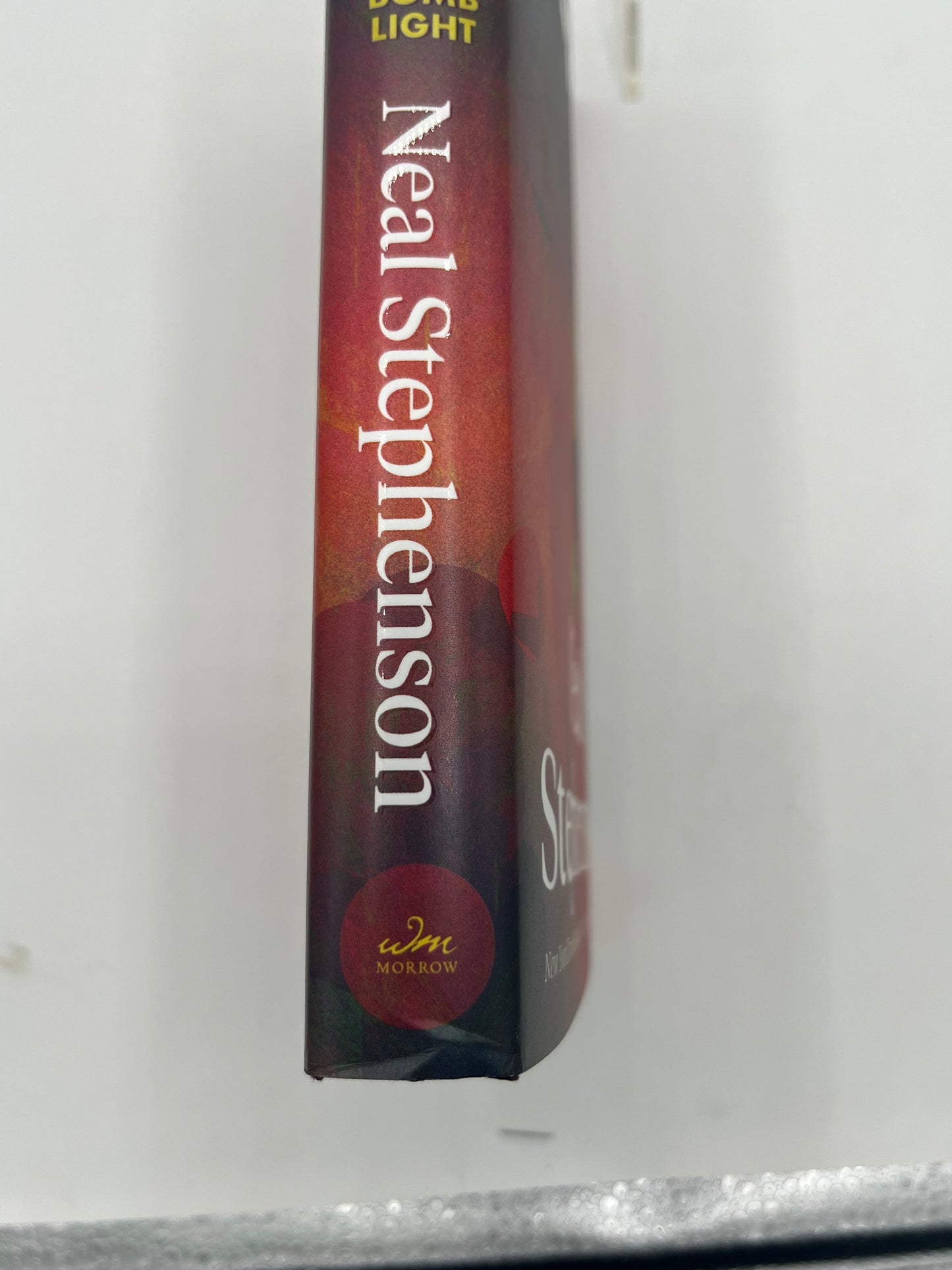 Preowned Very Good hardcover edition of Polostan by Neal Stephenson, published by Morrow, signed by the author. This signed copy shows a minor lower spine bump but is otherwise clean and well cared for. A compelling addition for fans of historical fiction, speculative storytelling, and collectors of signed science fiction and literary novels.