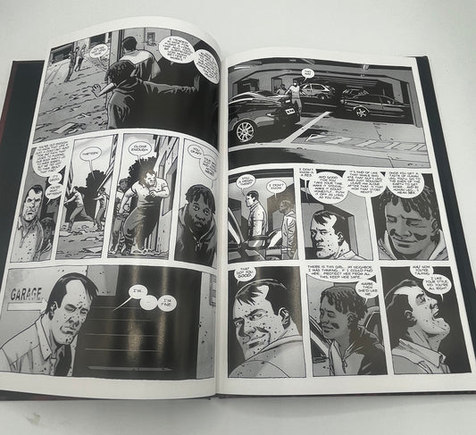 Preowned Like New hardcover edition of The Walking Dead: Here’s Negan! by Robert Kirkman with art by Charlie Adlard (Image Comics). This collectible graphic novel explores Negan’s backstory and is perfect for fans of The Walking Dead comics, horror graphic novels, and character-driven origin stories.