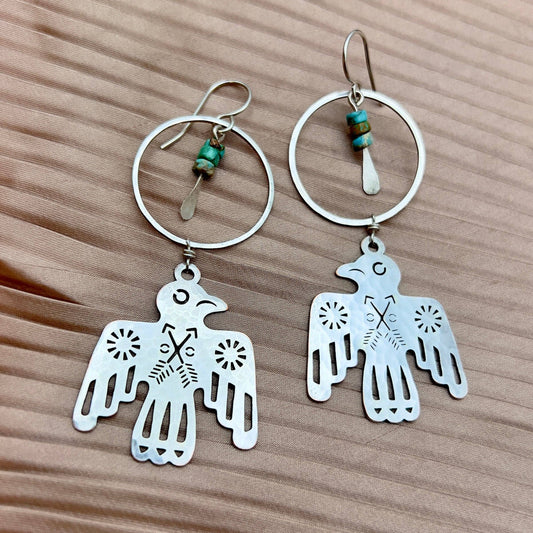 skye earrings bird and turquoise, silver bird hoop earrings, western inspired jewelry, turquoise heishi earrings, sterling silver bird earrings, nature travel earrings, bird earrings with turquoise, hypoallergenic silver earrings, wings over wild places jewelry, flight inspired earrings, handcrafted silver hoop earrings, boho bird earrings, turquoise and silver statement earrings, outdoor adventure jewelry, heishi bead bird earrings