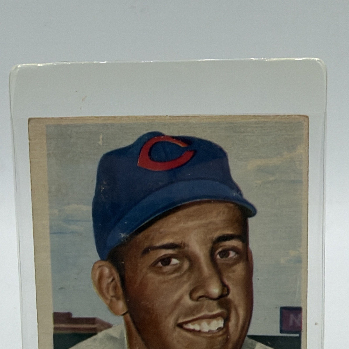 Close-up of illustrated Joe Nuxhall portrait wearing a Cincinnati Reds cap