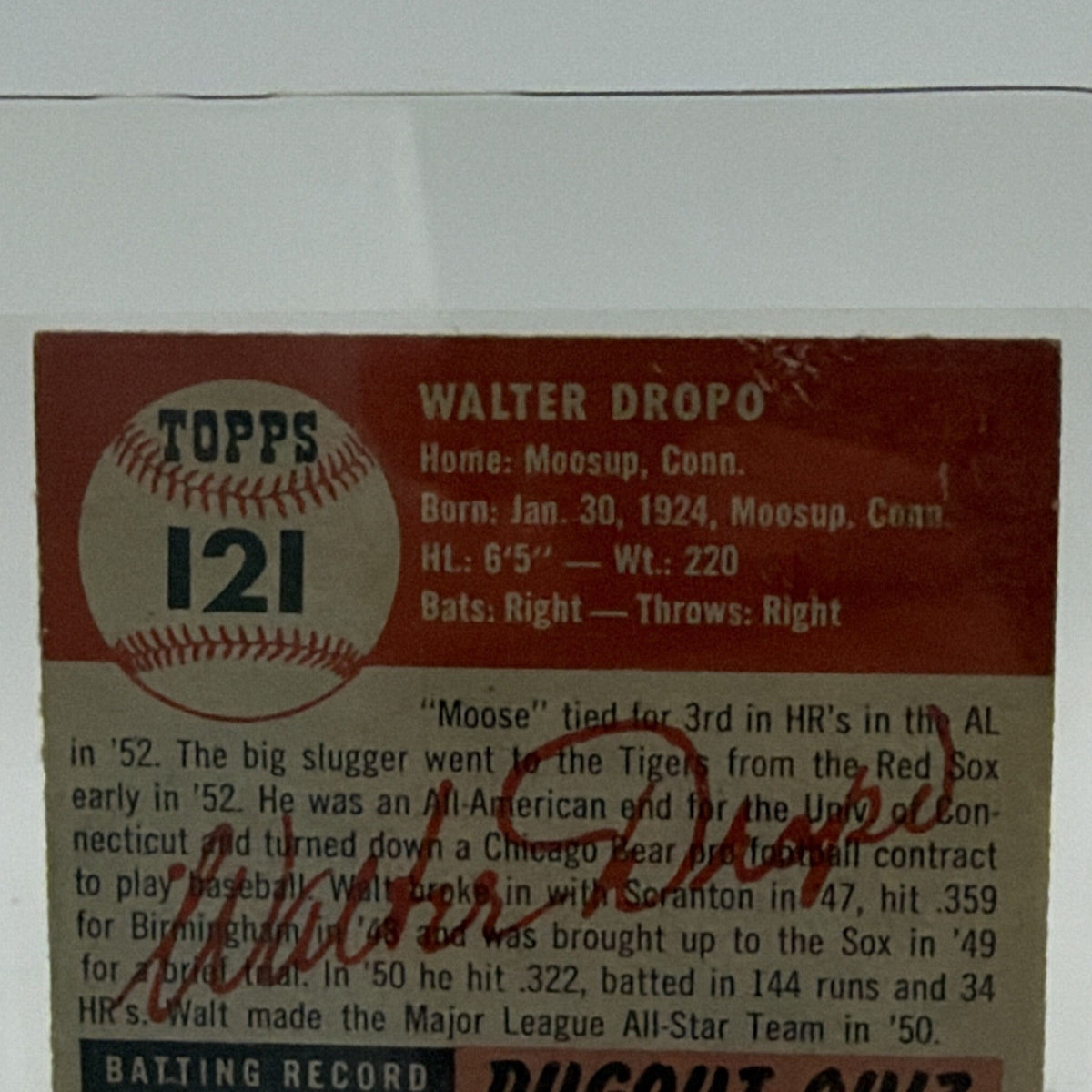 Close-up of card number 121 and printed information on the reverse