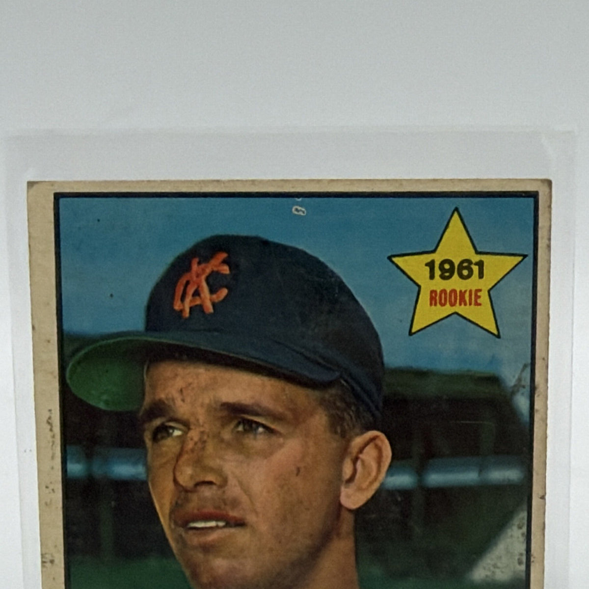 Close-up of Lou Klimchock wearing his Kansas City Athletics cap with yellow rookie star