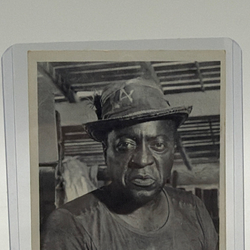 Close-up of Quarrel wearing a hat in the 1962 James Bond film Dr. No