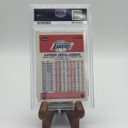 Back of a PSA-graded 1986 Fleer Kareem Abdul-Jabbar #1 basketball card showing career statistics and player information.