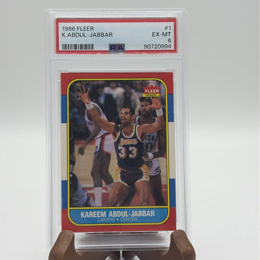 PSA EX-MT 6 1986 Fleer Kareem Abdul-Jabbar #1 basketball card featuring the Los Angeles Lakers Hall of Famer.