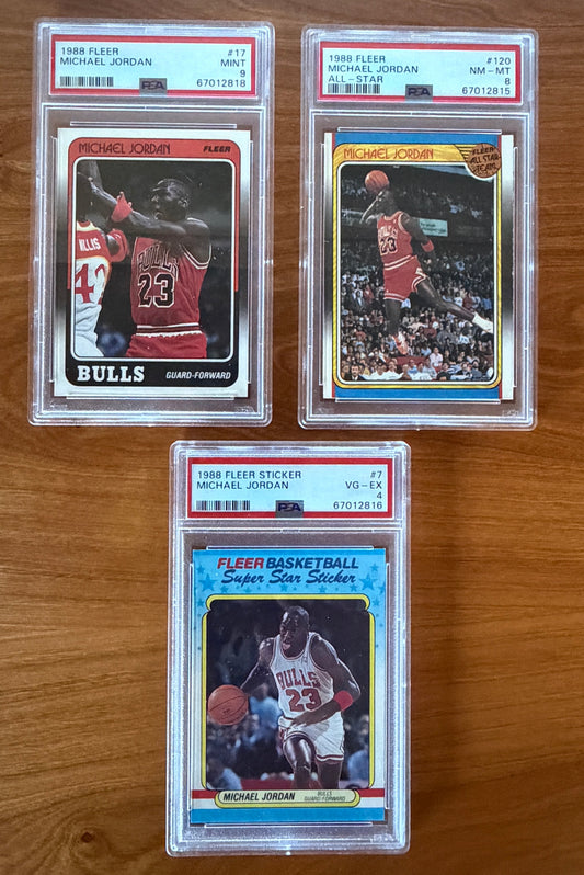 Three PSA-graded Michael Jordan cards from the 1988 Fleer Basketball complete collection, including the base card, All-Star card, and Super Star sticker.