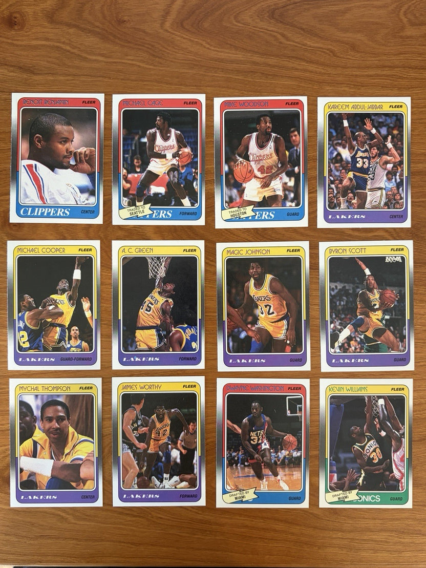 Los Angeles Lakers player cards from the 1988 Fleer Basketball complete collection featuring Magic Johnson, James Worthy, Byron Scott, and Kareem Abdul-Jabbar.