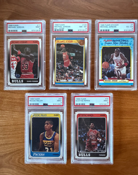 Five PSA-graded highlights from the 1988 Fleer Basketball collection featuring three Michael Jordan cards, Scottie Pippen rookie, and Reggie Miller rookie.