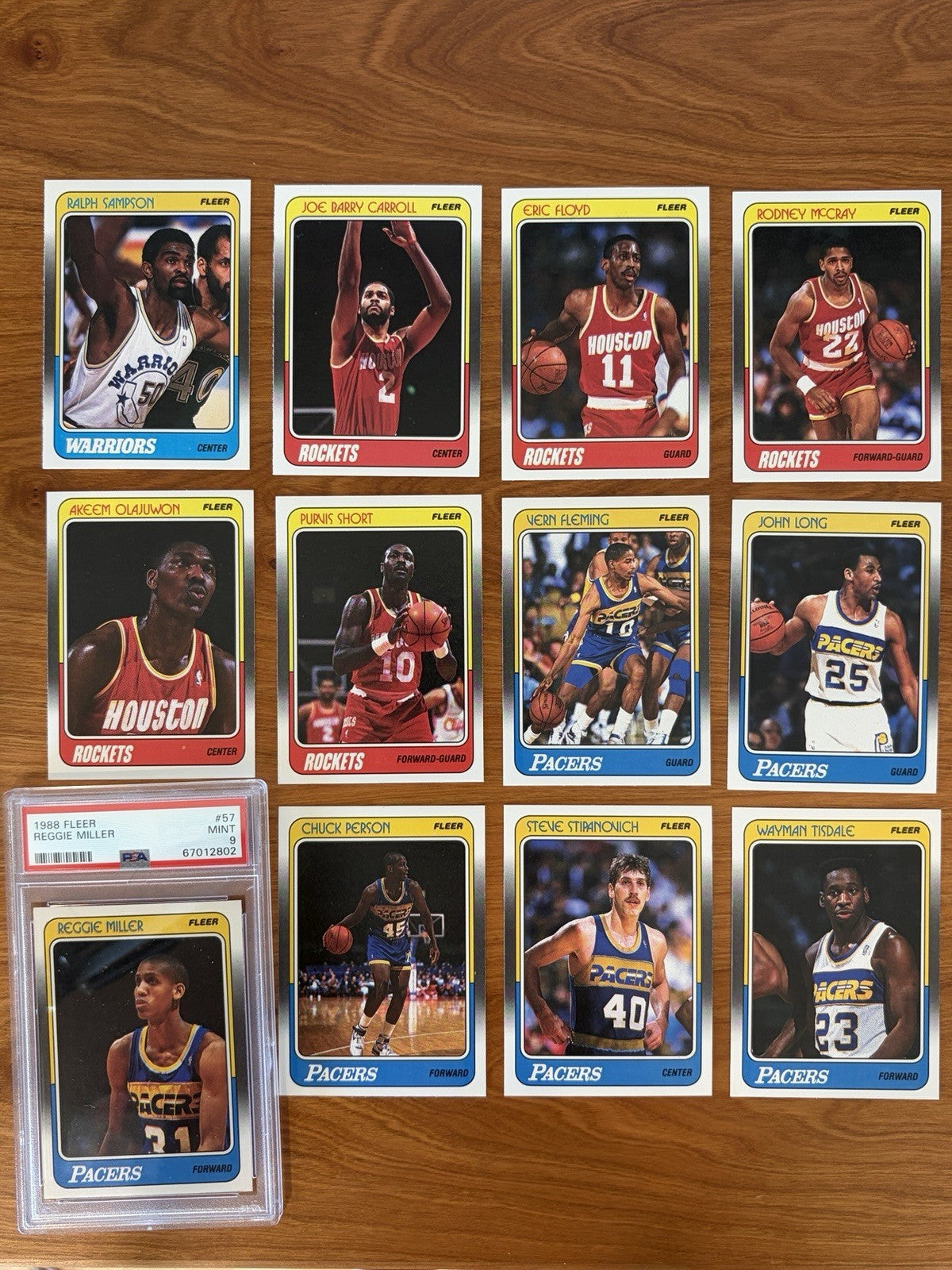 Houston Rockets and Indiana Pacers cards from the 1988 Fleer Basketball set featuring the PSA 9 Reggie Miller rookie card.