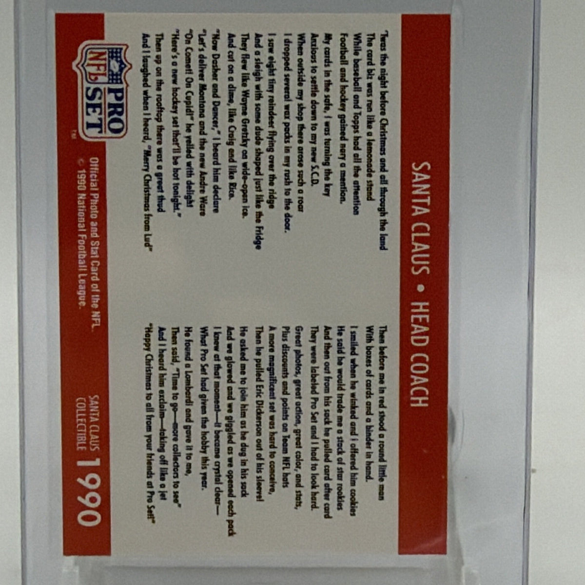 Close-up of printed text and red border on the reverse of Santa Claus card