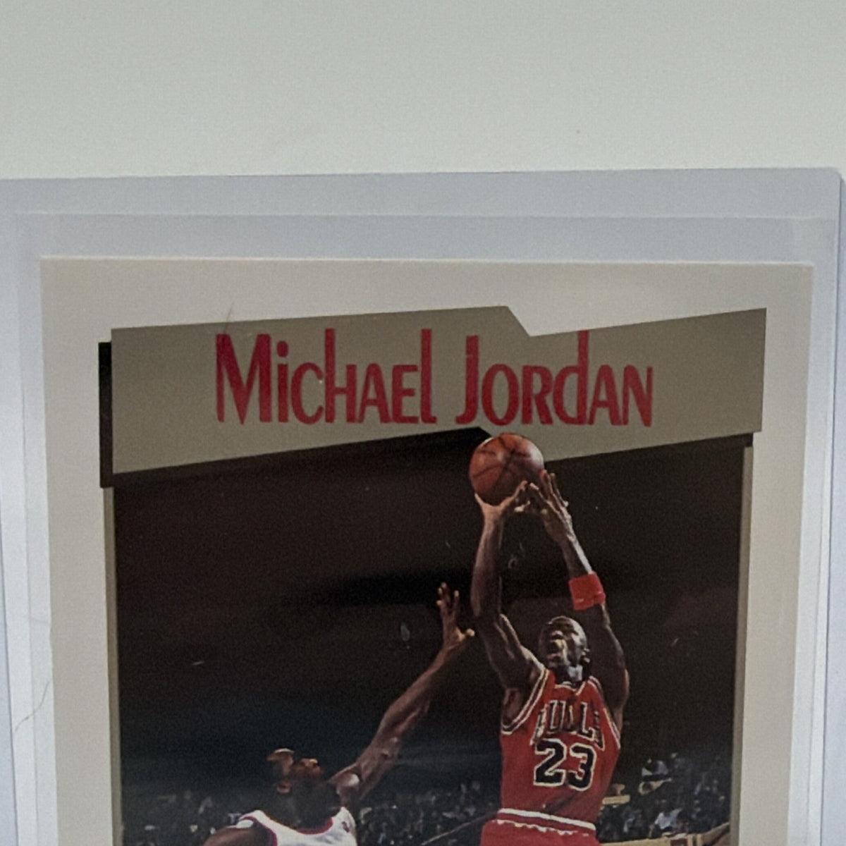 Close-up of Michael Jordan name and upper portion of Supreme Court card