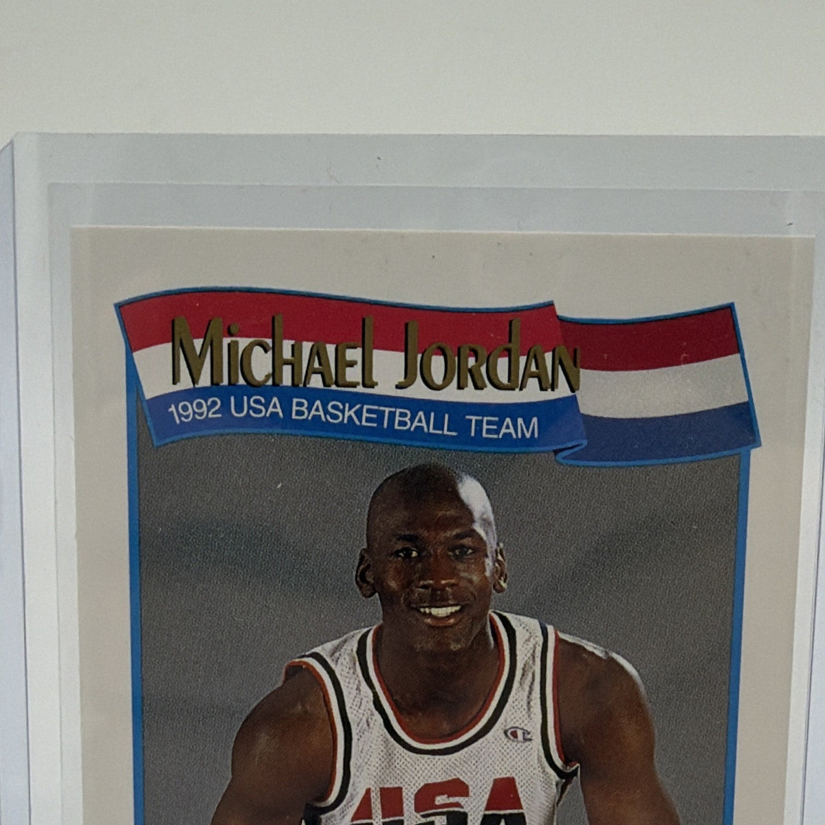 Close-up of Michael Jordan name and USA Basketball banner on card