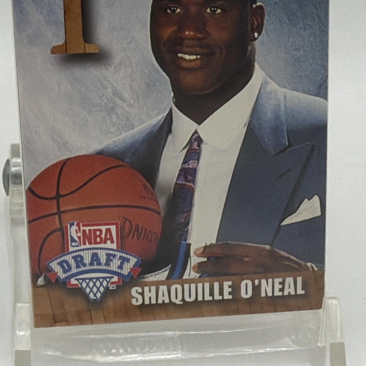 Detail of Shaquille O'Neal NBA Draft emblem and name on the sealed redemption set