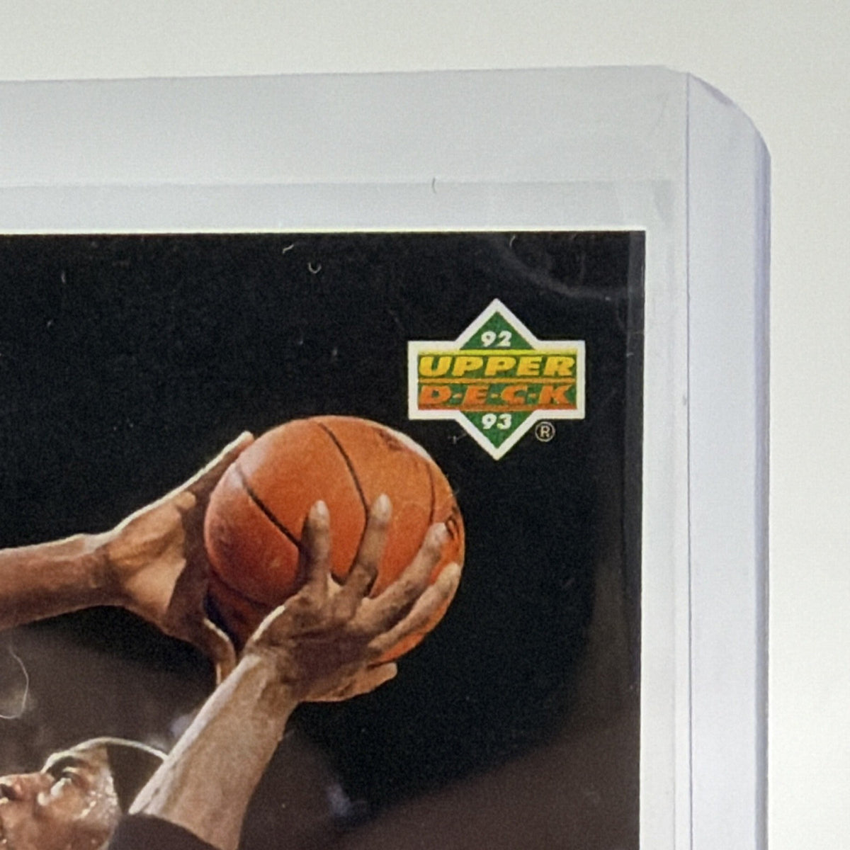 Detail of basketball and Michael Jordan's extended arm during a shot on Upper Deck All-Division Team #AD9