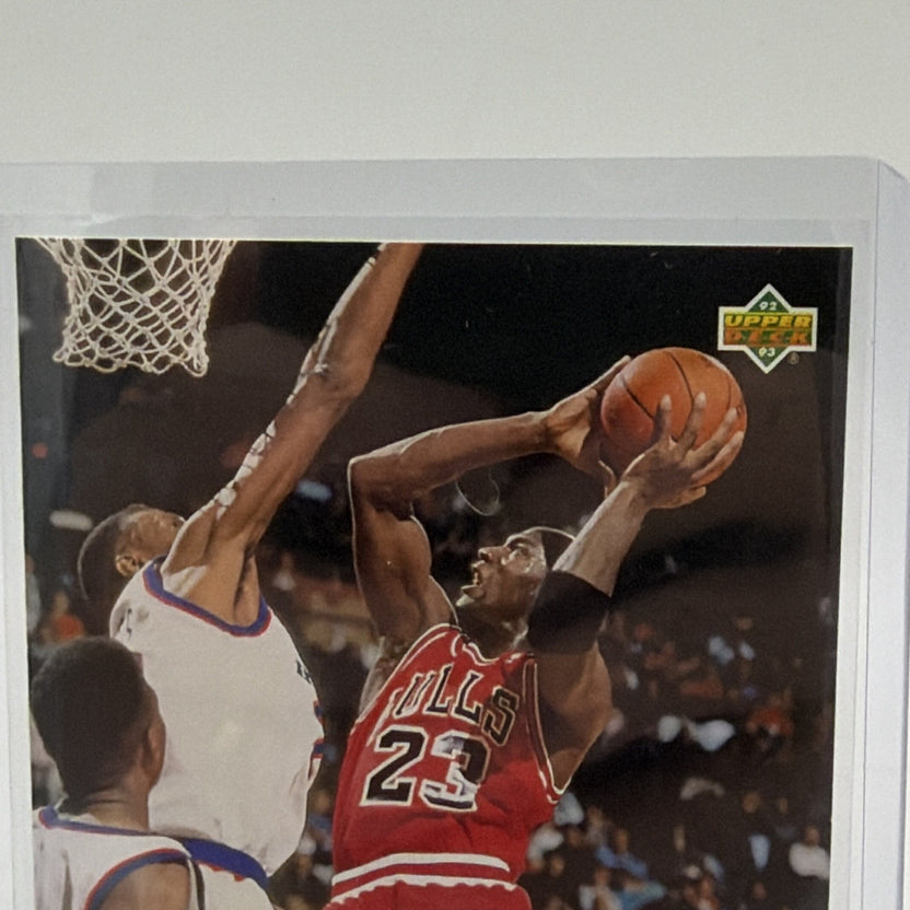 Close-up of Michael Jordan leaping toward the basket on his 1992–93 Upper Deck All-Division Team card
