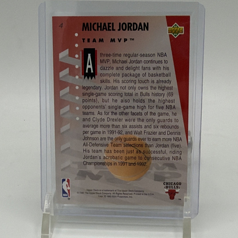 Reverse of 1992–93 Upper Deck Michael Jordan Team MVP Holograms #4 card featuring player information and Chicago Bulls graphics
