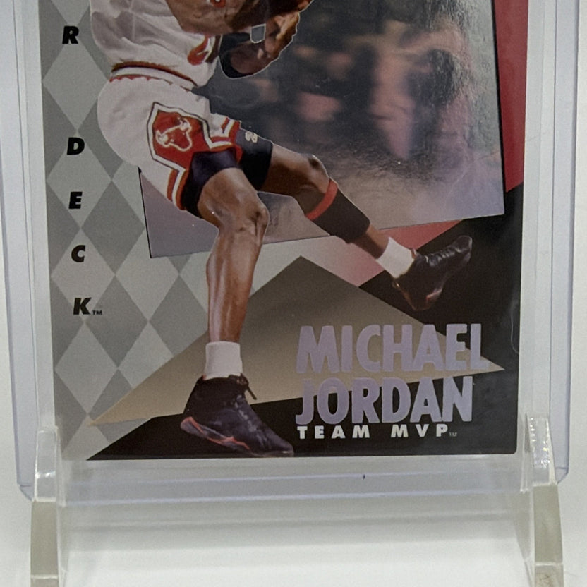 Close-up of Michael Jordan's name and the geometric holographic design on the 1992–93 Upper Deck Team MVP card