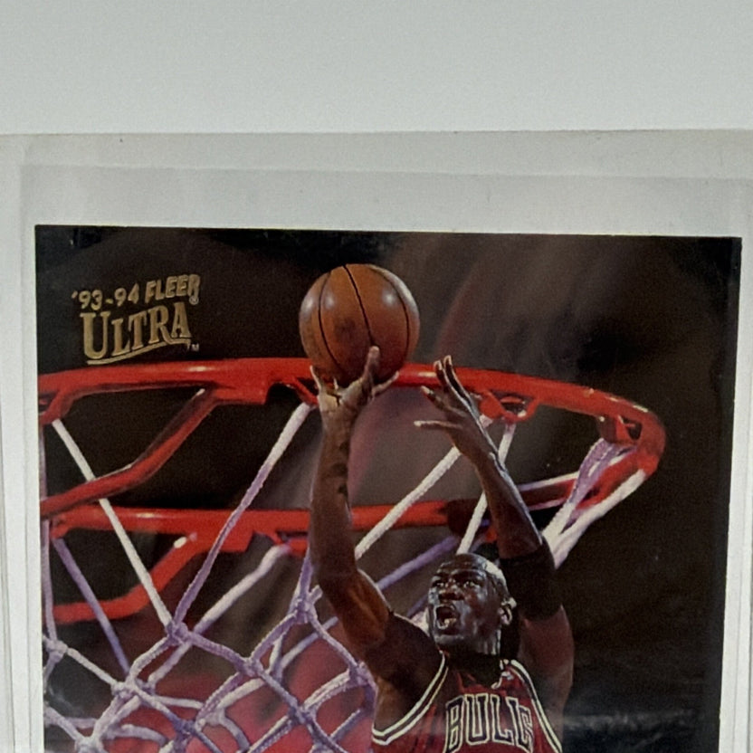 Close-up of Michael Jordan reaching toward the basketball hoop on Fleer Ultra insert