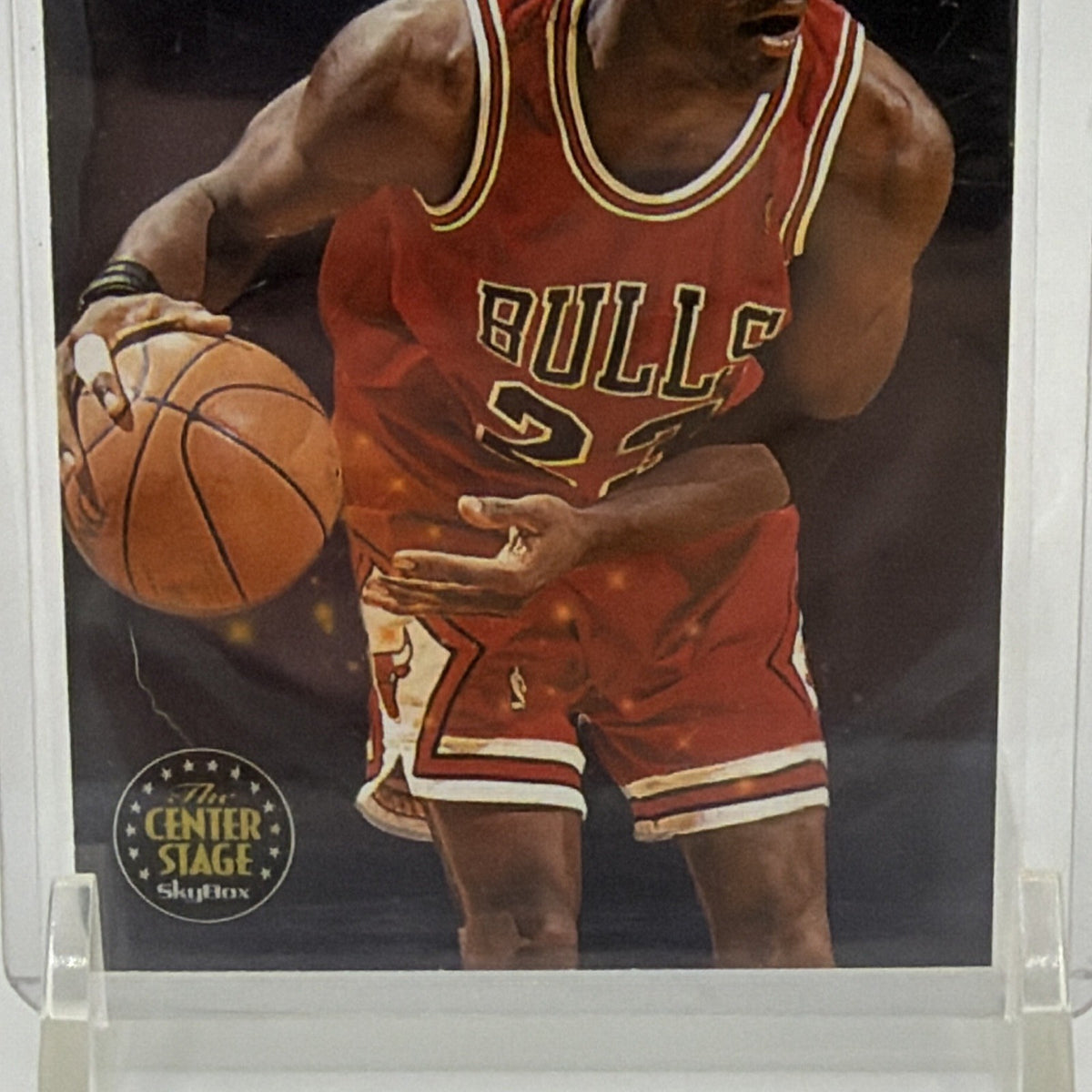 Detail of Michael Jordan in Chicago Bulls #23 uniform on Center Stage insert