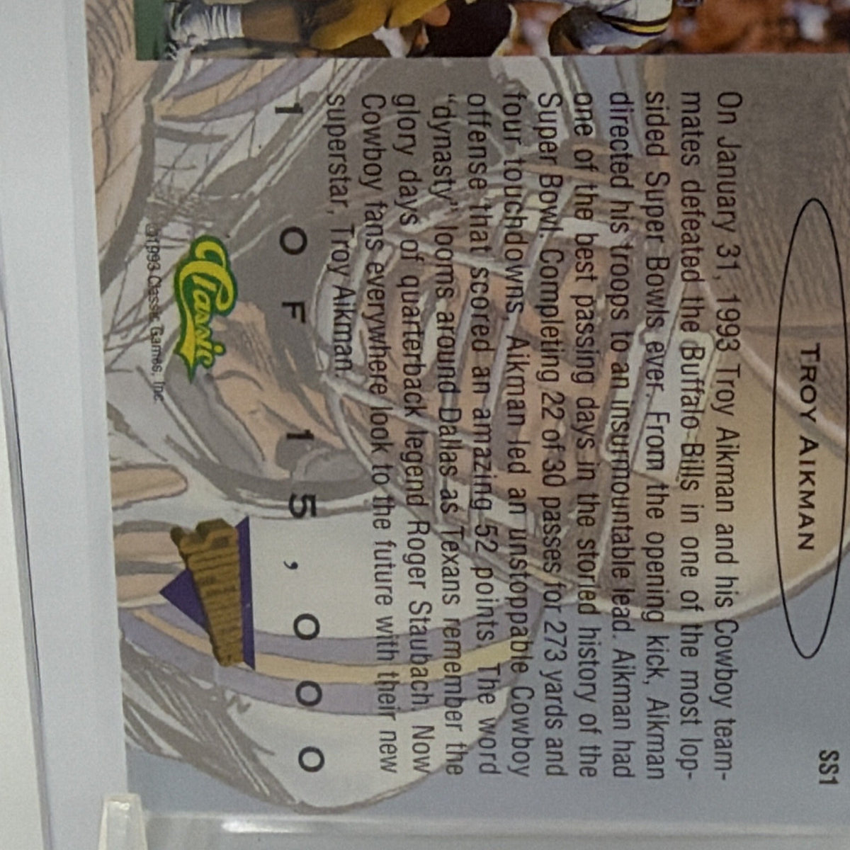 Close-up of text and graphics on the reverse of the Troy Aikman card