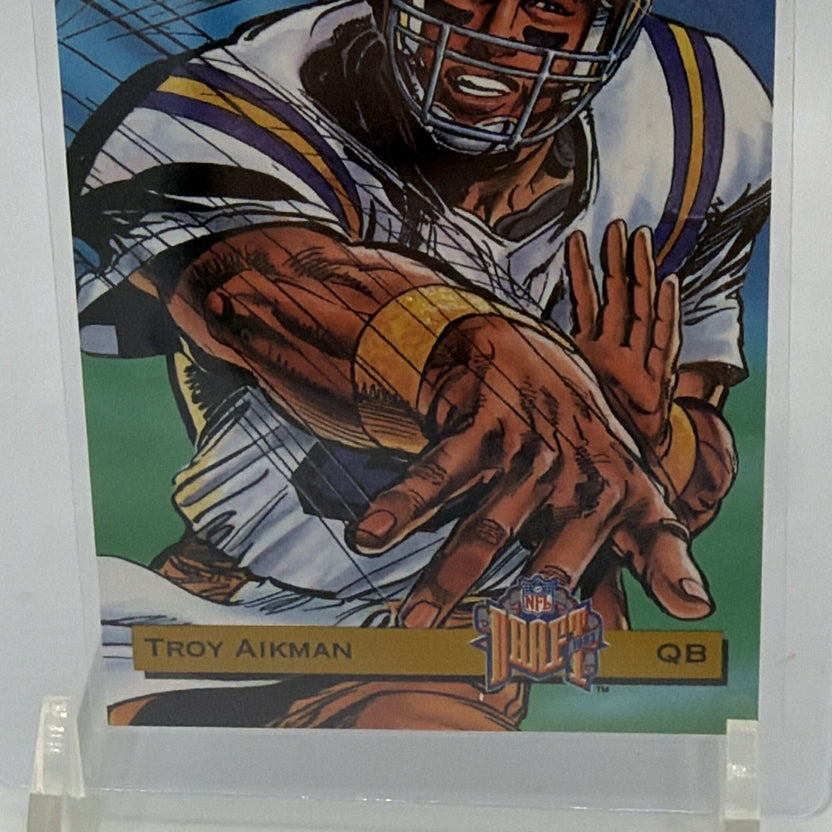 Detail of Troy Aikman illustrated football pose and card nameplate