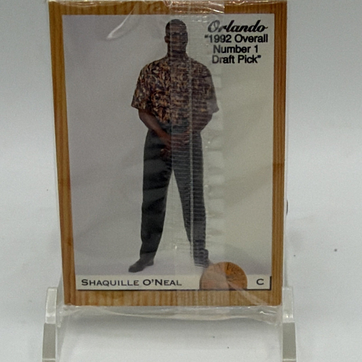 Reverse-facing card visible through protective packaging of 1993 Classic basketball set