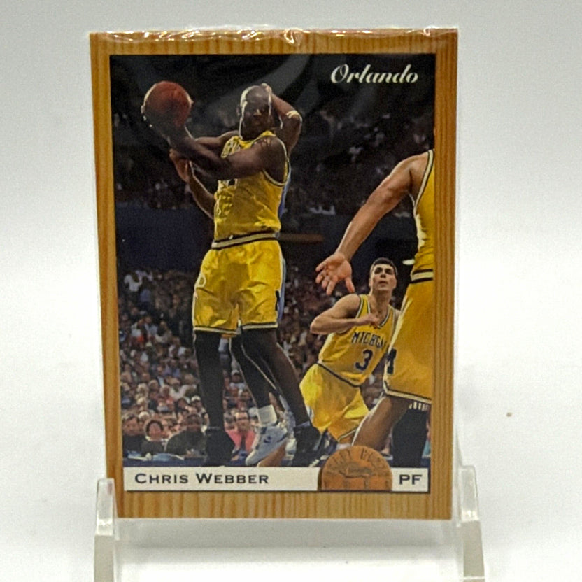 Chris Webber basketball card with woodgrain border from 1993 Classic Draft Picks set, displayed in protective case