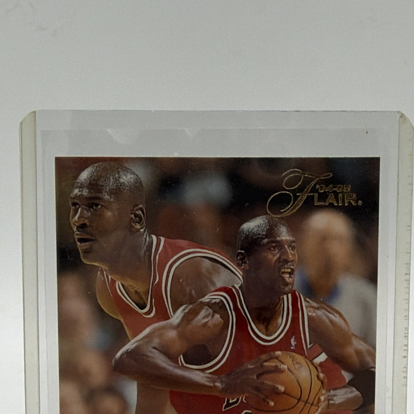 Upper front detail of Michael Jordan in Chicago Bulls #45 uniform on 1994-95 Flair card