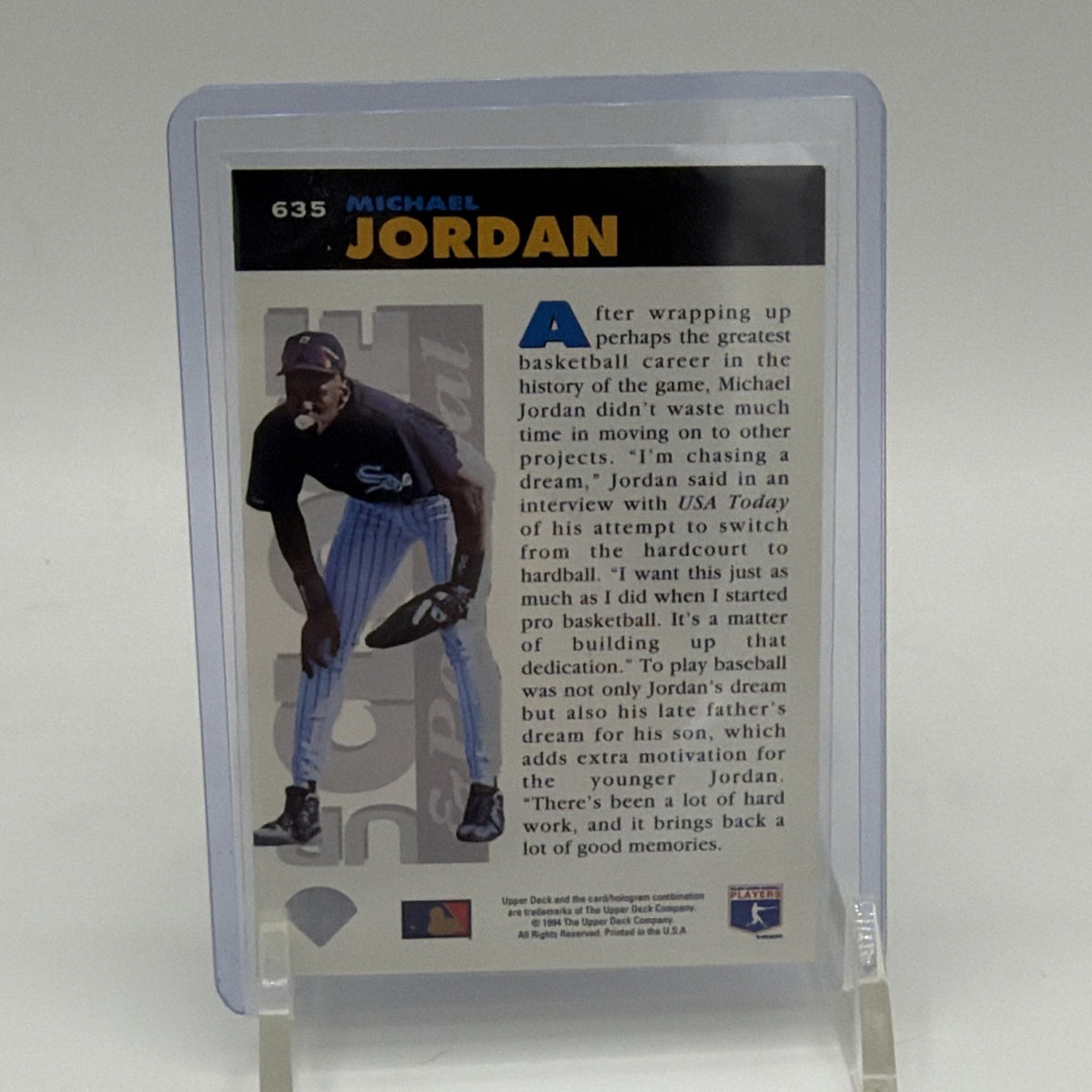 Reverse of 1994 Upper Deck Collector's Choice Michael Jordan #635 featuring baseball photograph and player biography