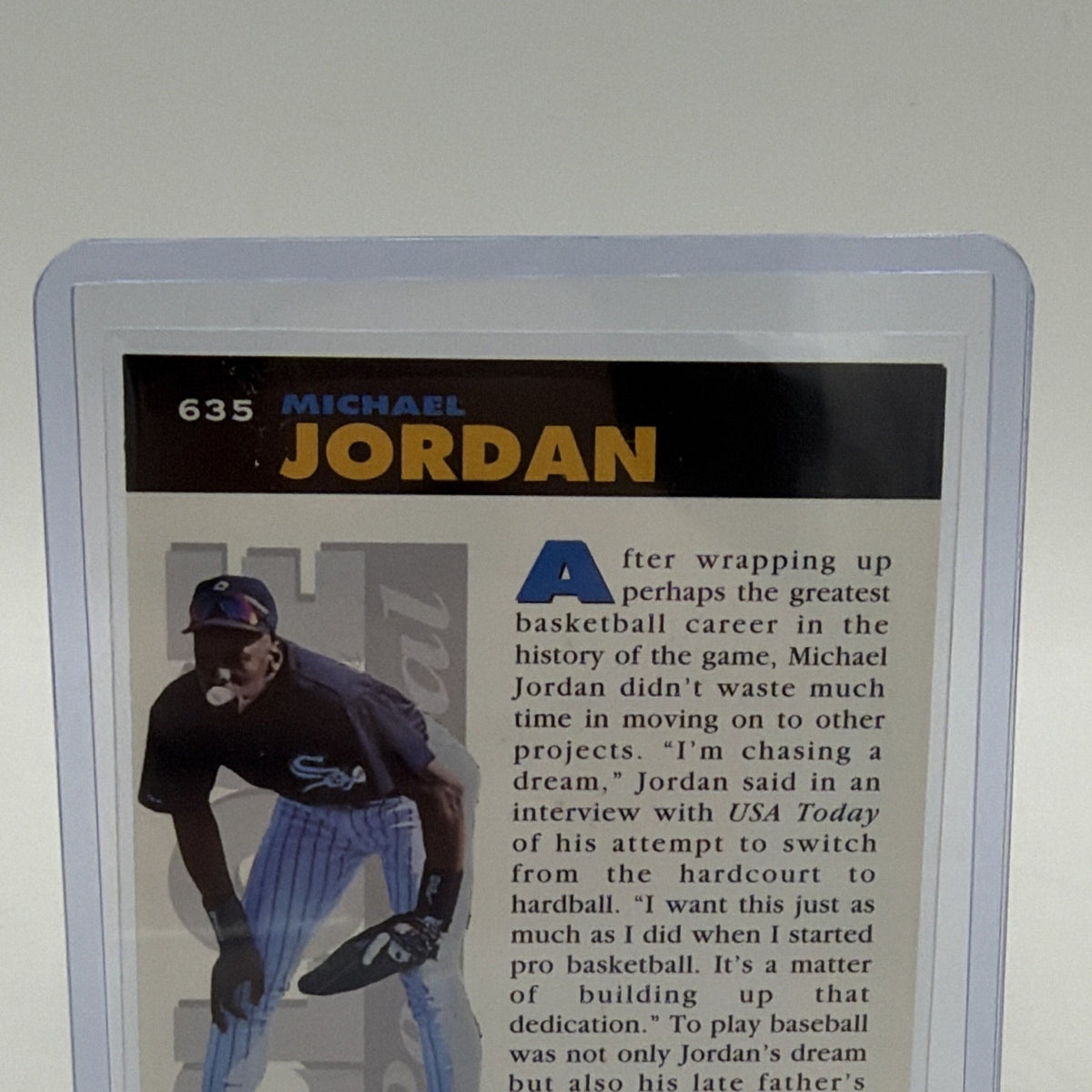Close-up of upper reverse of Michael Jordan #635 showing his name and Birmingham Barons baseball photograph