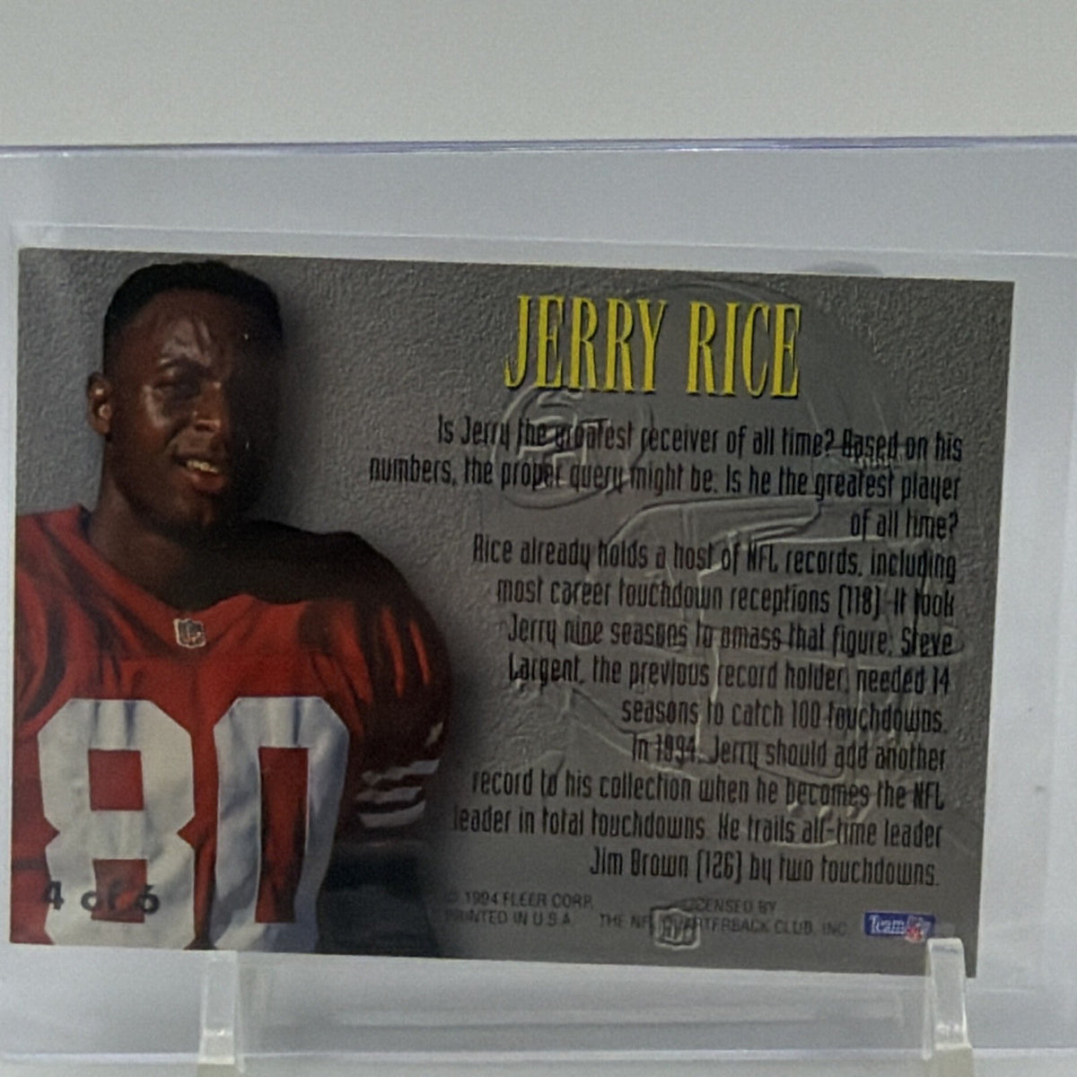Reverse of 1994 Fleer Jerry Rice Living Legends insert with player photograph and biography