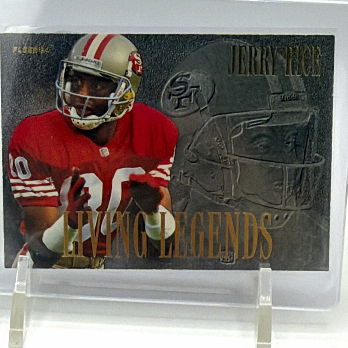 Front of 1994 Fleer Jerry Rice Living Legends football card featuring Rice in a red San Francisco 49ers uniform