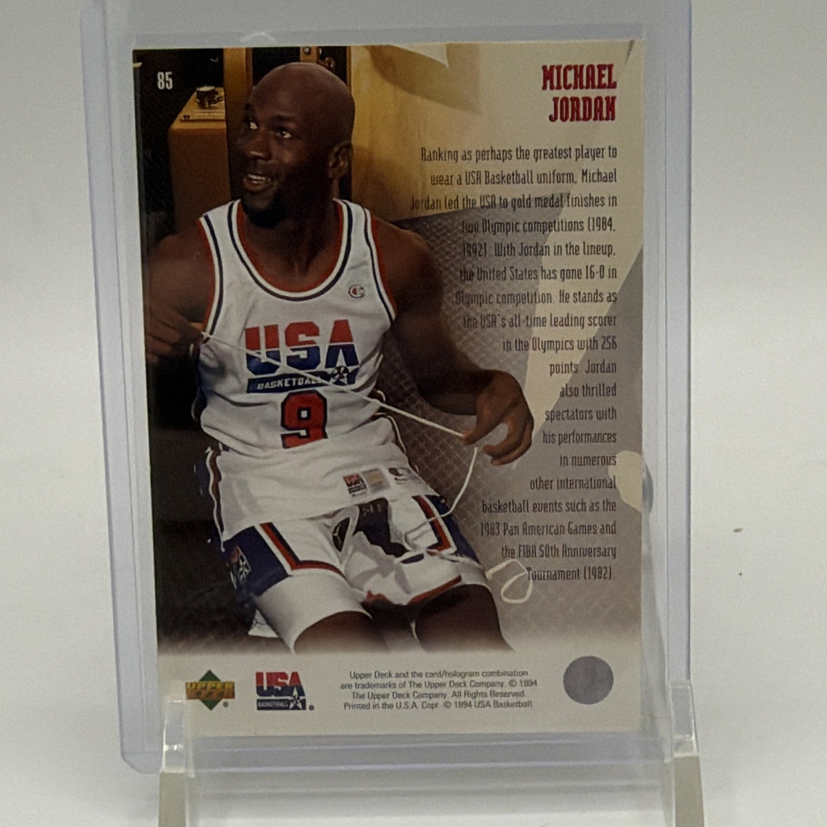 Reverse of 1994 Upper Deck USA Basketball Michael Jordan #85 showing player photographs and biographical text